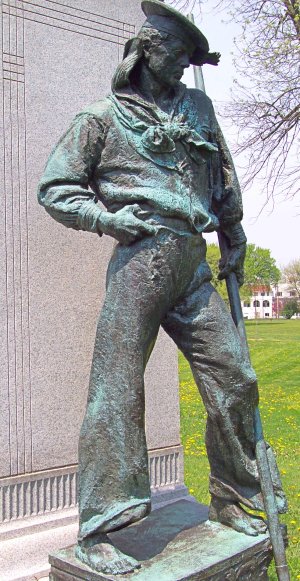 Statue of sailor from Spanish-American War with thumb hooked in his belt.