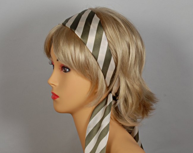 olive green and beige headscarf attached to plastic headband