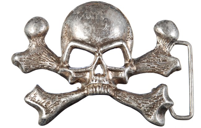 antique silver belt buckle, hollow eyed chrome skull and crossbones