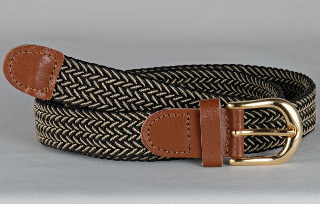 narrow braided knitted stretch belt, each chord in braid knitted from black and beige thread, tan leather tabs and brass buckle