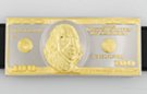 silver and gold $100 dollar bill belt buckle
