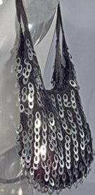 black crochet sling bag spangled with silver tear-drop sequins, sheer lining, magnetic closure