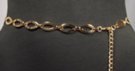 gold chain belt made of 29 inches of 5/8"-wide ovals and 14 inches of chain with heart-shaped pendant