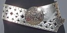3" smooth wide belt with rivets and cut-outs; 3.5" circular distressed metal buckle; rides low on hips with extra long overhang