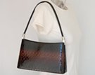 black/brown alligator embossed short shoulder evening purse, zipper top, nickel polish swivel carry attachment, hardsided