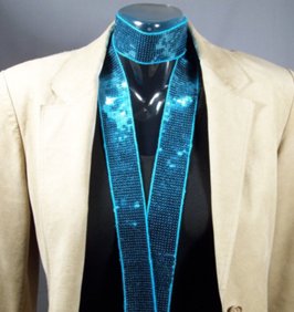 blue beaded sequin sash shown with ultra suede coat
