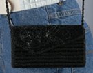 small beaded shoulder clutch with rose pattern flap