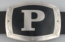 belt buckle with chrome initial "P" on black field