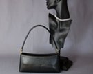 black short evening shoulder purse, zipper top, nickel polish swivel carry attachment, hardsided full grain look