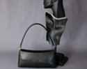 black short evening shoulder purse, zipper top, nickel polish swivel carry attachment, hardsided full grain look