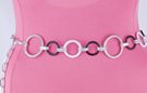 furrowed circles chain belt: quarter-sized black alternating with medium white and large antique silver circles, all joined by double furrowed bright silver oval links, which are also used to make a chain extension tipped by one of the black circles