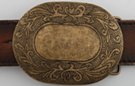 oval pitted bronze belt buckle with floral design