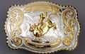 silver and gold tone rodeo bull rider western belt buckle