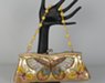 Soft synth matalicleather party clutch with intricate colorful sequin and bead embroidered butterflies on both sides, snap closed, adding a flare for evening party/dinner
