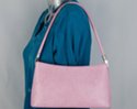 pink cord strap shoulder purse with flowing contour