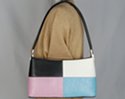 cord strap shoulder purse with flowing contour