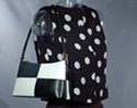 cord strap shoulder purse with flowing contour