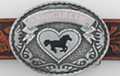 oval pebbled pewter and enamel "Cowgirl Up" belt buckle