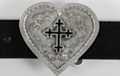 heart-shaped belt buckle with enameled black fleur-de-lis cross in center