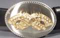 crossed pistols with rhinestones on oval buckle