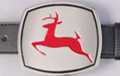 belt buckle, red buck on mirror chrome