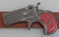 gunmetal derringer pistol belt buckle with dark red handle
