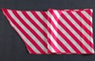 satin belt scarf, hot pink and white in alternating "candy cane" diagonal bars