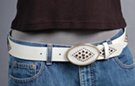1-1/2" textured leather strap belt, diamond pattern of brass studs and eyelets with central amber stone on oval hook-style buckle, strap and tip