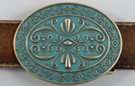 verdigris and bronze diamond and scroll oval belt buckle