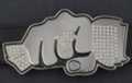 rhinestone belt buckle showing fist with diamond and cash
