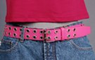 leather belt with double rows of metal eyelets, double prong roller buckle and plain leather retainer