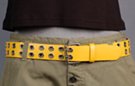 leather belt with double rows of metal eyelets, double prong roller buckle and plain leather retainer