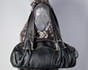 black ruched teardrop east-west handbag with U-bolt ornaments