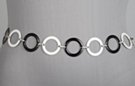 chain belt made of alternating black and white enameled ring links