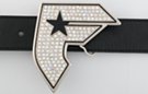 curved "F" belt buckle covered in rhinestones with star