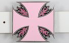 pink belt buckle in shape of Maltese cross with flames