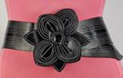 wide black vinyl belt with big flower buckle and topstitching