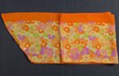 chiffon belt scarf, riot of blossoms in oranges, green, pink and violet with orange border