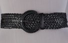 wide faux leather braided glitter belt with circular braided buckle