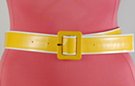 medium width yellow vinyl belt with center bar buckle and white border