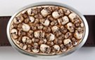 oval belt buckle, skulls with glow-in-dark eyesockets