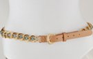 gold chain belt; smooth double links inset with transparent blue diamond-shaped beads; tan leather tab with gold buckle