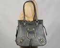 large guitar-shaped north-south shoulder bag