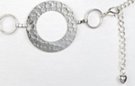 silver chain belt made of "hammered" wheels alternating with circular rings