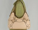 medium hobo handbag with harness ring and cross-hatch strap ornamentation