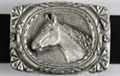 rectangular belt buckle with horse head and mane in profile with fancy rope border
