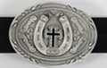 oval pewter western belt buckle with black enamel cross inside horseshoe
