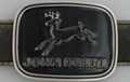John Deere belt buckle in chrome on black