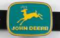 belt buckle, John Deere name and deer logo in yellow on Persian green