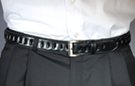 1-1/8" black leather casual/dress belt; ornamental loops in center, single stitch edge, tabs and keeper; 1-3/4" by 1-1/2" rectangular gray nickel polish buckle